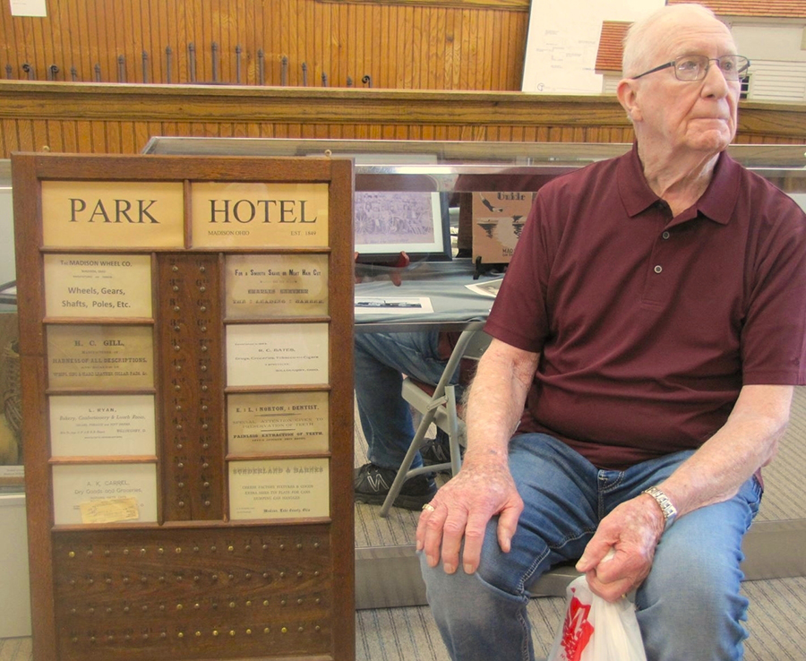 Dick Louis with his hotel key rack